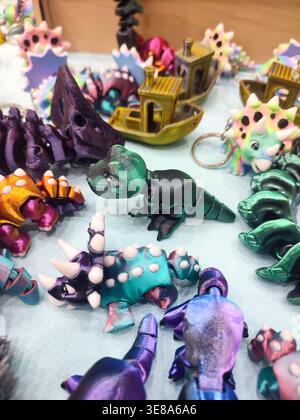 3D printed different art objects. Objects printed on 3D printer from melted colored plastic. Multicolored models created on 3D printer from threads of molten plastic. Modern new additive technologies Stock Photo