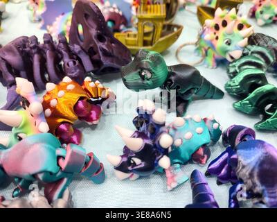 3D printed different art objects. Objects printed on 3D printer from melted colored plastic. Multicolored models created on 3D printer from threads of molten plastic. Modern new additive technologies Stock Photo