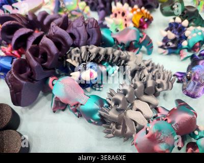 3D printed different art objects. Objects printed on 3D printer from melted colored plastic. Multicolored models created on 3D printer from threads of molten plastic. Modern new additive technologies Stock Photo