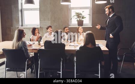 Business managers discussing project plans in office Stock Photo