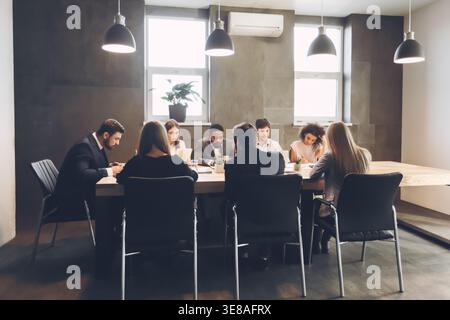 Teamwork concept. Colleagues working together on project Stock Photo