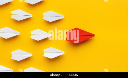 Collage of Paper Airplanes Showing Movement and Direction on a Bright Background Stock Photo
