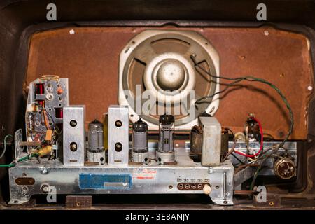 Interior of an old radio with valves and electrical components. Stock Photo