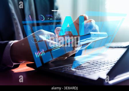 Business professional using a smartphone above a laptop with futuristic AI dashboards and charts, representing mobile analytics, automation, smart tec Stock Photo