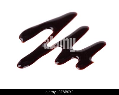 Chocolate sauce drizzle isolated on white background. Liquid chocolate syrup smear or splash. Clipping path Stock Photo