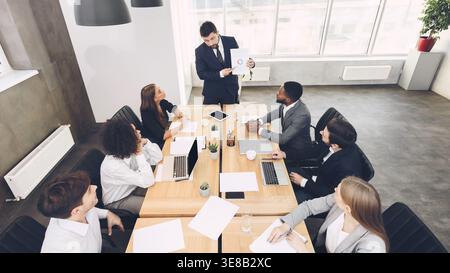 Business people discussing results of their teamwork Stock Photo