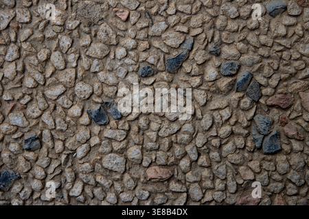 Seamless stone background texture, natural rock surface with uniform pattern, neutral tones for graphic design and backgrounds Stock Photo