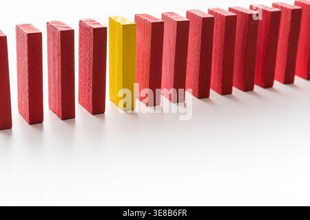 Collage of Red and Yellow Blocks Arranged in a Line on a White Background During Daytime Stock Photo