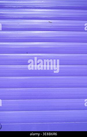 Rows of purple painted metal for a modern design. The Concept of uniformity. Stock Photo