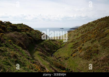 Views from the footpath above Porth Ysgo, Rhiw, Aberdaron, Llyn Peninsula towards Maen Gwenonwy and Yny Gwylan on a sunny day Stock Photo