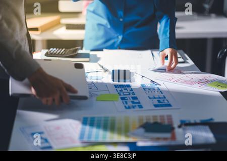 Team of Program Developer Collaborating on UXUI Design Planning in a Modern Office Environment Stock Photo