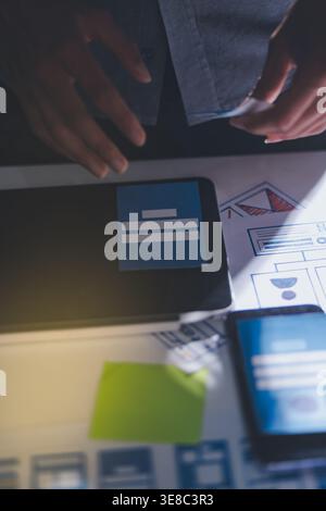 Team of Program Developer Collaborating on UXUI Design Planning in a Modern Office Environment Stock Photo