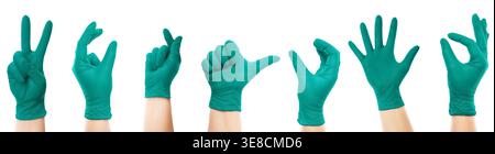 Set of hands in green medical gloves showing various gestures and signs. Isolated on a white background. Perfect medical banner or collage for healthc Stock Photo