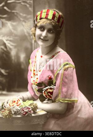 Portrait of a young and beautiful woman. Postcard, circa 1900. Stock Photo