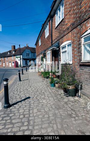 Lees Road at its junction with the High Street, with Yalding Post office in the Background Stock Photo