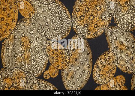 Detailed macro shot of a decorative fabric or wallcovering displaying a retro inspired pattern of textured brown and grey ovals. Stock Photo