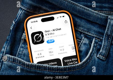 Antalya, Turkey - March 24, 2026: Grok AI app displayed on smartphone inside denim pocket Stock Photo