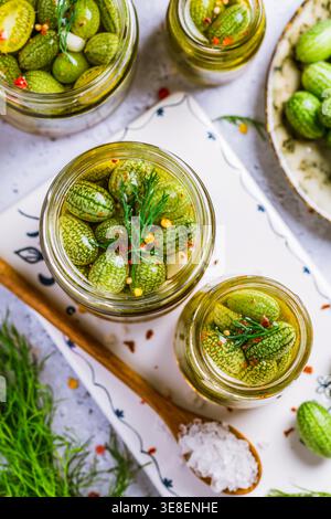 Homemade food: Pickled cucamelons (pickled cucumbers, pickled gherkins), grown in a organic garden Stock Photo
