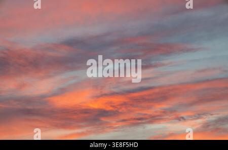 Soft pastel sunset sky with pink, orange and blue clouds at dusk in Myrtle Beach, South Carolina, USA Stock Photo