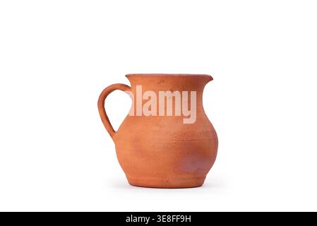 Rustic Clay Pitcher with Handle Isolated on White. Antique Rustic earthenware jug with Aged Terracotta surface Stock Photo