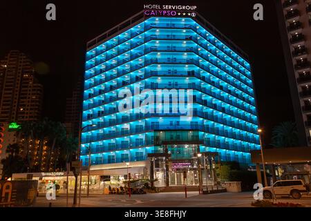 The Hotel Servigroup Calypso in Benidorm, Spain, illuminated at night Stock Photo