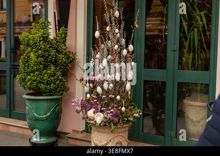 Decorated Egg Tree Outside Green Doorway Stock Photo