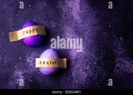 Easter eggs painted in purple color Stock Photo