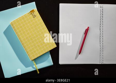 Office Notebooks and Pen Arranged for Planning and Note Taking Stock Photo