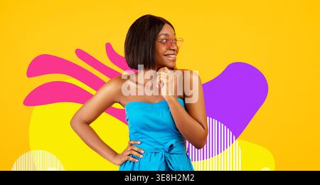 Pretty Black Lady Poses in Blue Dress on Orange Background With Vibrant Colors Stock Photo