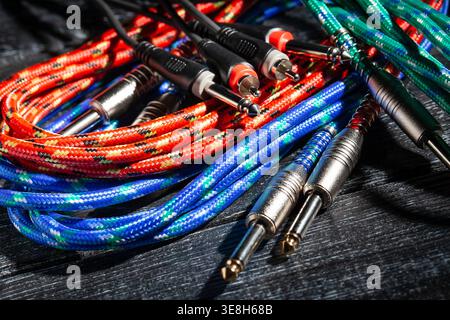 rca ts audio cable on black wood background Stock Photo