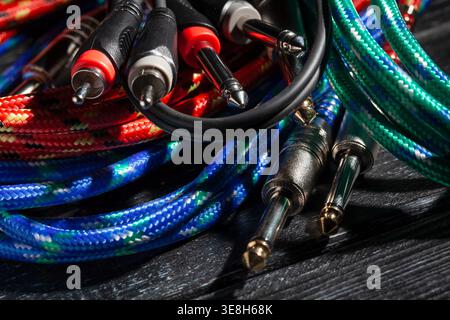 rca ts audio cable on black wood background Stock Photo