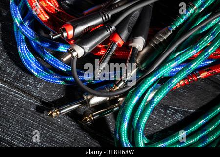 rca ts audio cable on black wood background Stock Photo