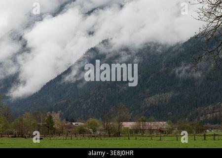 Dark clouds drift over the buildings of the banking district in ...