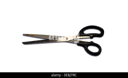 Old Used Universal Scissors with Black Handles Isolated on White Background Stock Photo