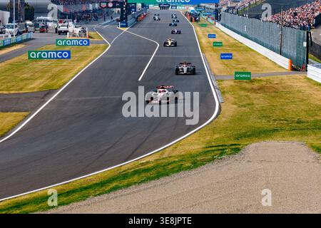 29th March 2026; Suzuka Circuit, Suzuka, Japan; 2026 FIA Formula 1 Japanese Grand Prix Race Day; TGR Haas F1 Team driver Oliver Bearman of Great Britain, Audi Revolut F1 Team driver Nico Hulkenberg of Germany during the race at the Aramco Japanese Grand Prix Stock Photo