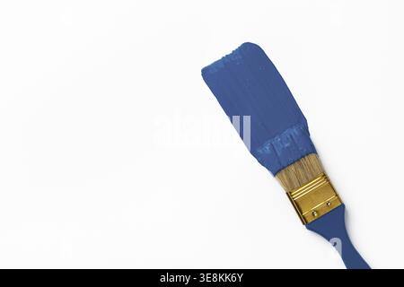 Paint brush stroke of Classic blue color on white background. Top view Stock Photo