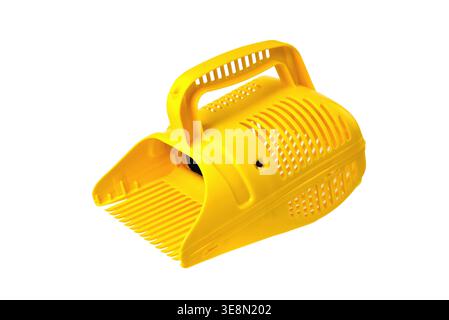 yellow berry picking scoop, special scoop for accelerating berry picking on wild plantations, device for picking blueberries, bilberries and cranberri Stock Photo