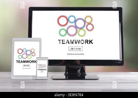 Teamwork concept shown on different information technology devices Stock Photo
