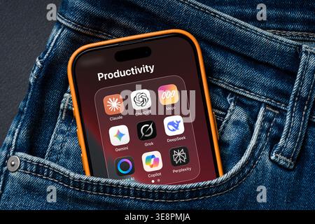 Antalya, Turkey - March 24, 2026: Smartphone showing multiple AI apps in denim pocket closeup Stock Photo