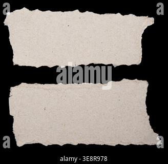 Two pieces of ripped paper on black background Stock Photo