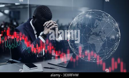 Businessman Looking Worried While Analyzing Market Data and World Map in Office Setting Stock Photo