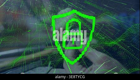 Displaying green shield with padlock over blurred adult woman in room with data grid, holding phone Stock Photo