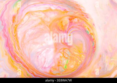 Pastel abstract swirl pattern with pink yellow and orange flowing liquid marble texture Stock Photo
