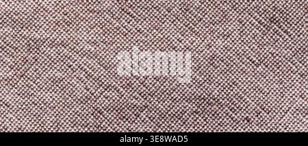 Pink mauve woven fabric texture background with geometric diamond pattern close-up Stock Photo