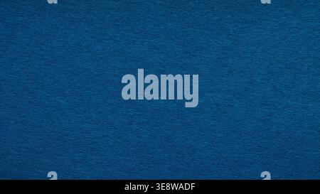 Dark blue paper texture background with subtle grain for design and copy space Stock Photo