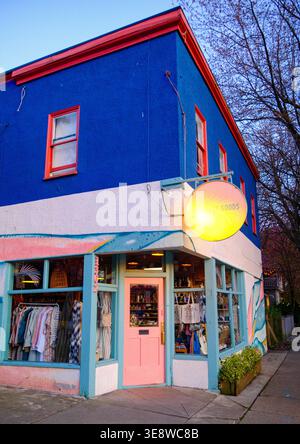 A pink door leading to the Coast Goods shop on Victoria Drive in East Vancouver, BC. Stock Photo