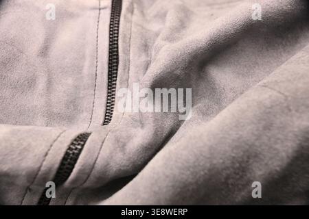Grey Pure Leather Jacket with Black Zip — Creased Texture Macro Close-Up with Soft Defocused Backgrounds Stock Photo