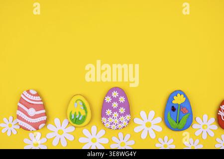 Easter cookies on a bright yellow background. Idea for an Easter gift, beautiful background. Space for text Stock Photo