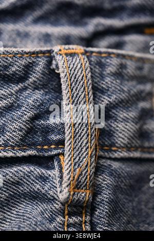 Blue Denim Jeans Back Side Belt Loops — Creased Fabric Texture Macro Close-Up with Soft Defocused Backgrounds Stock Photo