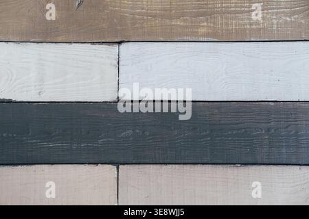 Wooden background from painted boards in the same style. Dark and light boards in monochrome concept. Place for your text. Aged tree. Designer stylish Stock Photo